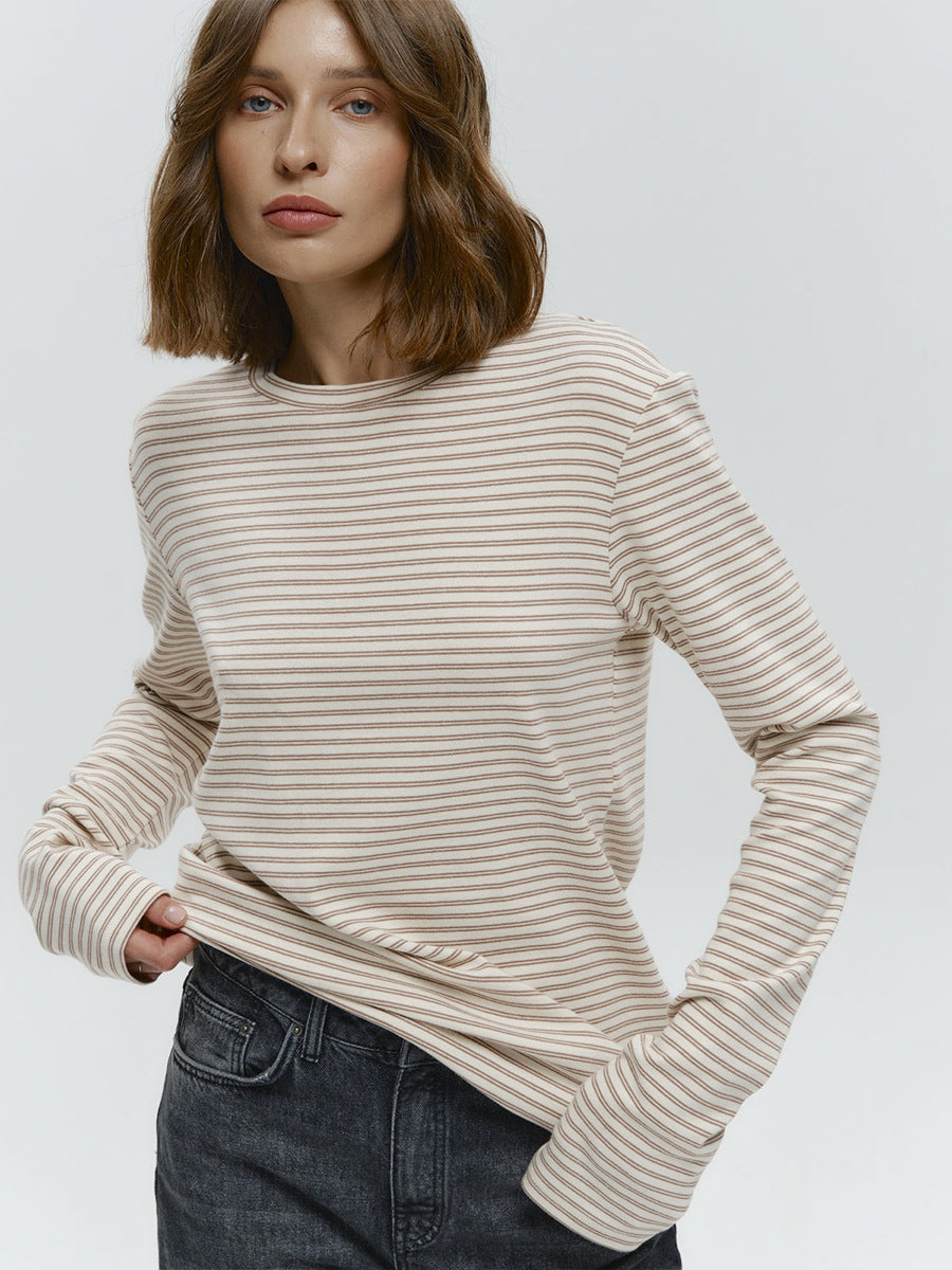 Striped Cotton Crew Neck Long Sleeve Tee in Oat Stripe — front view on model