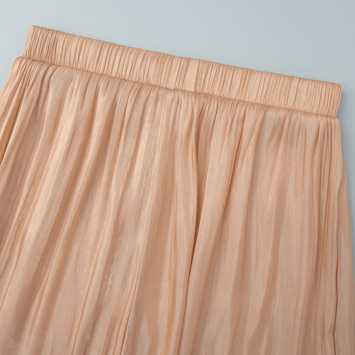 Shiny Pleated Harem Pants with Elastic Cuffs in Champagne — close-up of the elastic waistband