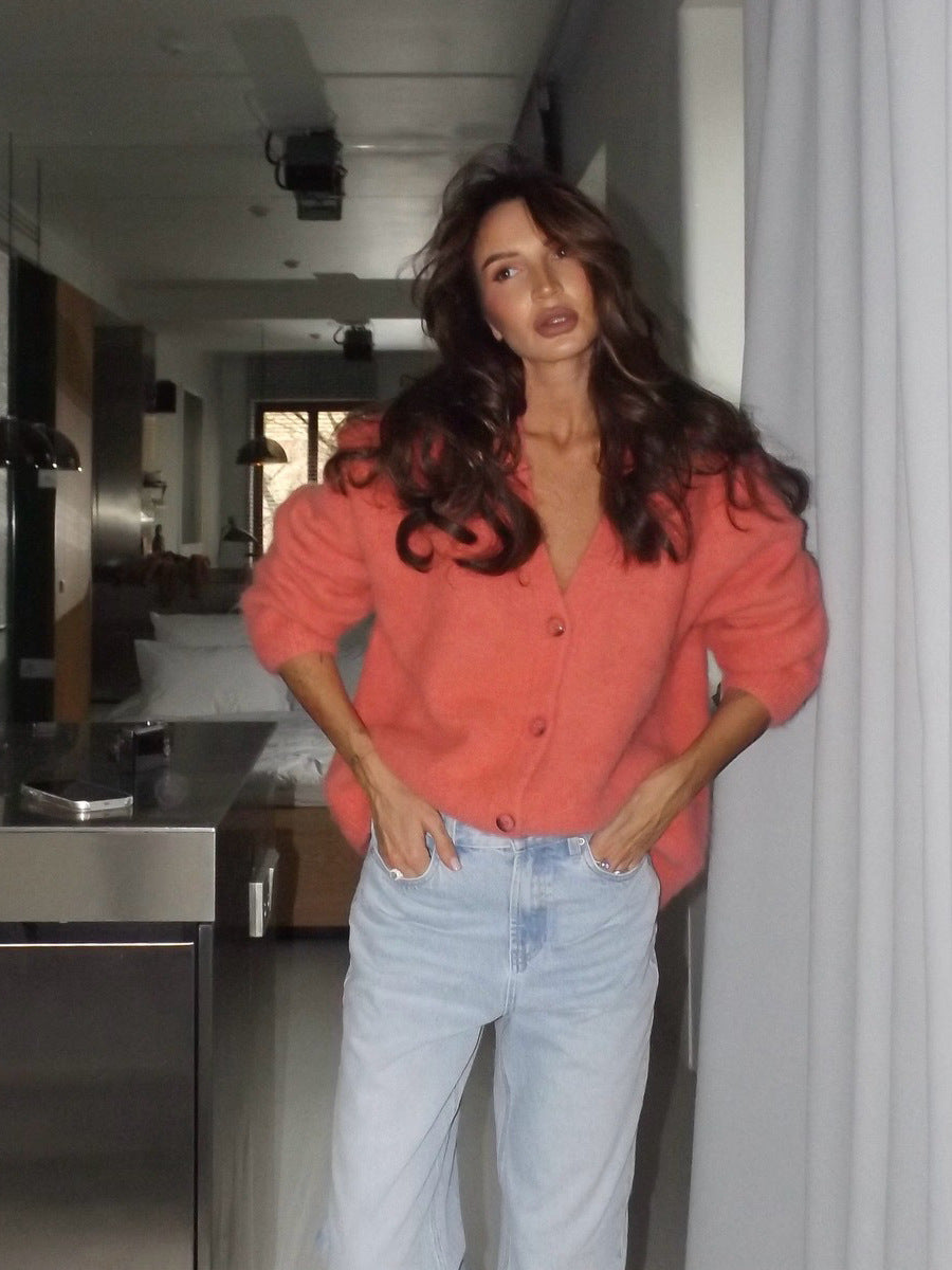 Fuzzy Wool-Blend V-Neck Button Cardigan in Coral — front view on model with jeans