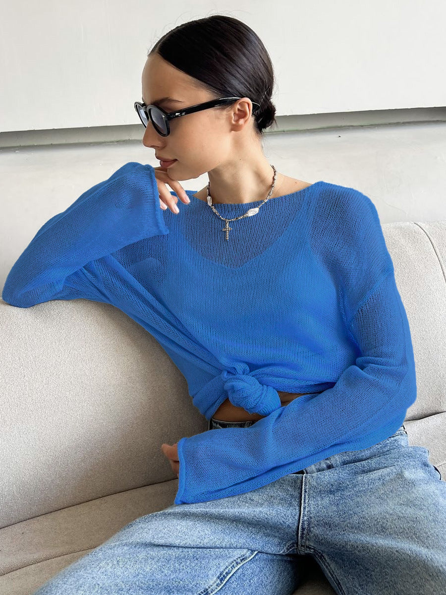 Sheer Open-Knit Bell Sleeve Sweater in Royal Blue — seated on model, tied at waist