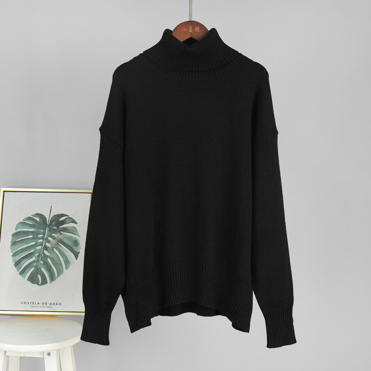 Oversized Knit Turtleneck Sweater in Black — front view