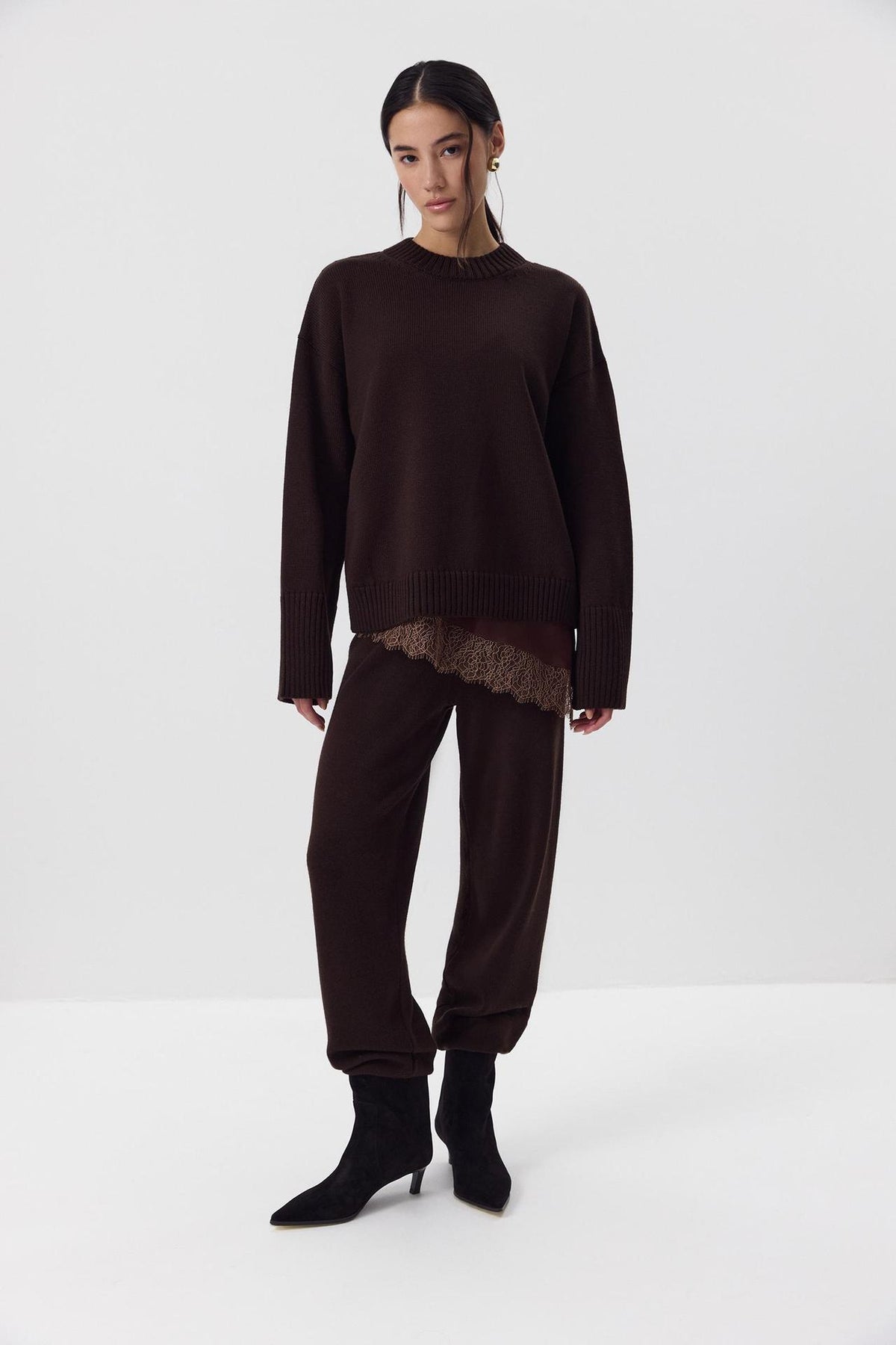 Relaxed Cotton Crew Neck Sweater with Ribbed Cuffs in Espresso — full-length front view on model