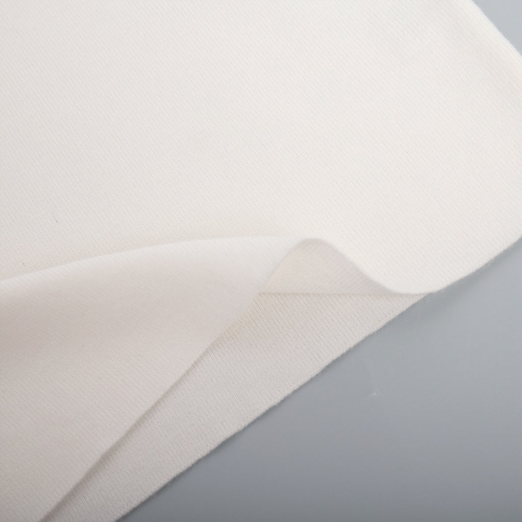Off-Shoulder Fold-Over Knit Sweater in Ivory — close-up of the fold-over band