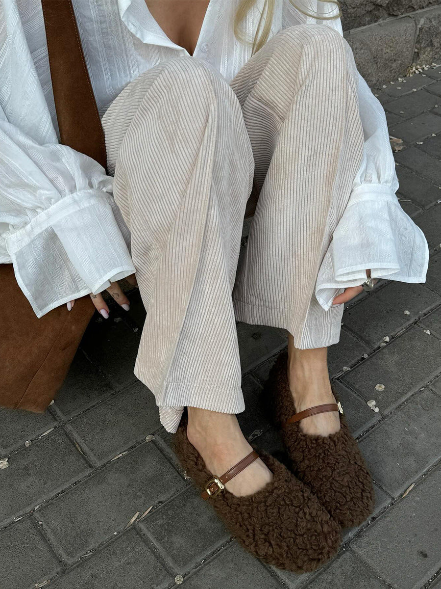 Cotton Corduroy Wide-Leg Pants with Pintuck Front in Cream — close view of the legs on model