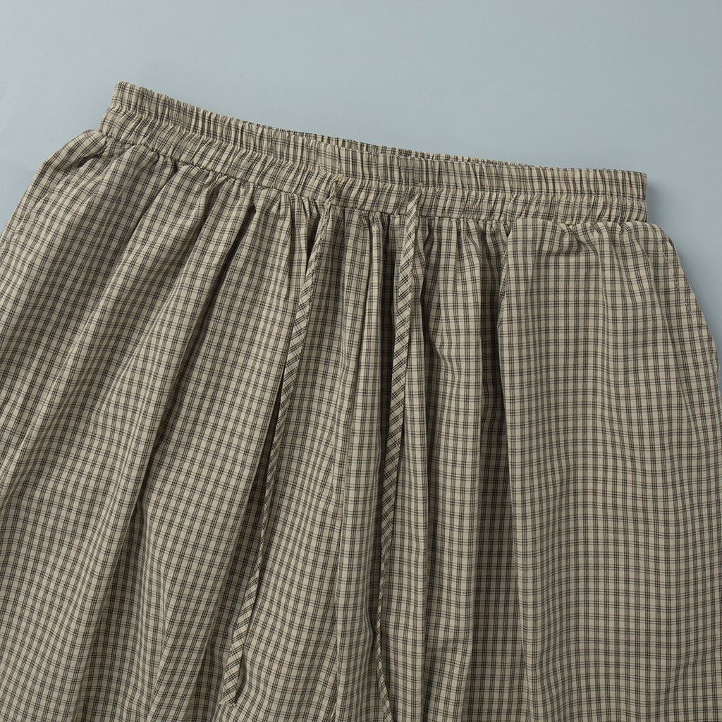 Cotton-Rayon Check Balloon Harem Pants in Khaki Check — close-up of the elastic waist and check