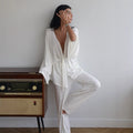 Wrap Tie Top & Wide-Leg Lounge Pants Set in White — front view on model
