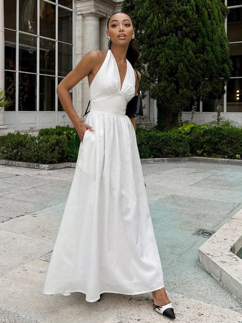 Cotton Halter V-Neck Maxi Dress in White — front view on model, outdoors