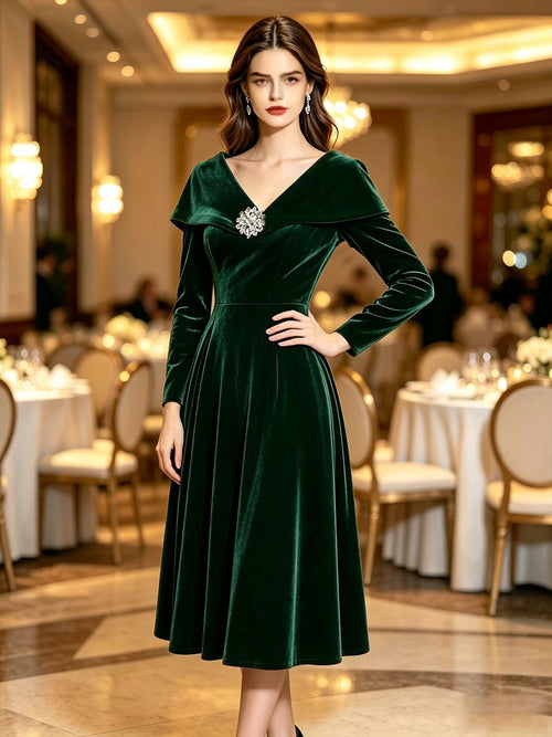 Velvet Midi Dress with Portrait Collar and Rhinestone Brooch in Emerald — front view on model