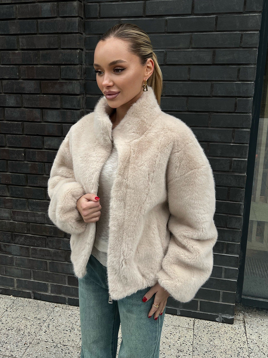 Plush Faux Fur Zip-Up Jacket with Stand Collar in Cream — front view on model, worn open