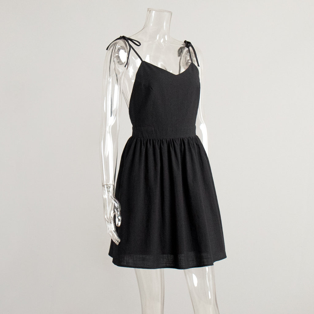 Tie-Shoulder Open-Back Cotton Mini Dress in Black — side view on mannequin