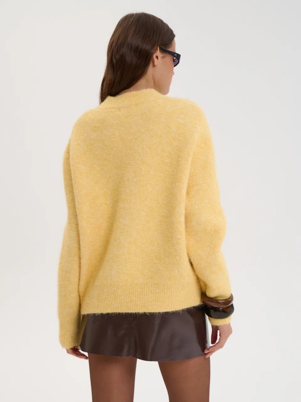 Brushed Fuzzy Knit Crew Neck Sweater in Butter Yellow — back view on model