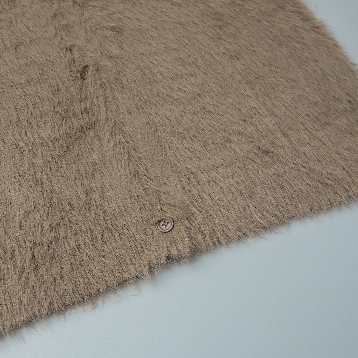 Fuzzy Knit Oversized V-Neck Cardigan in Mocha — close-up of button