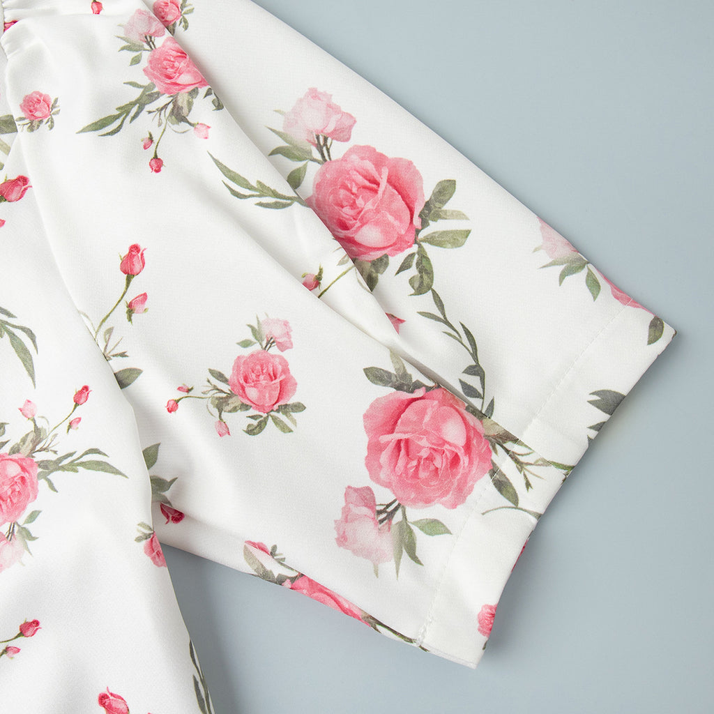 Floral Puff-Sleeve Mini Dress with Contrast Collar in Cream Floral — close-up of the puff sleeve