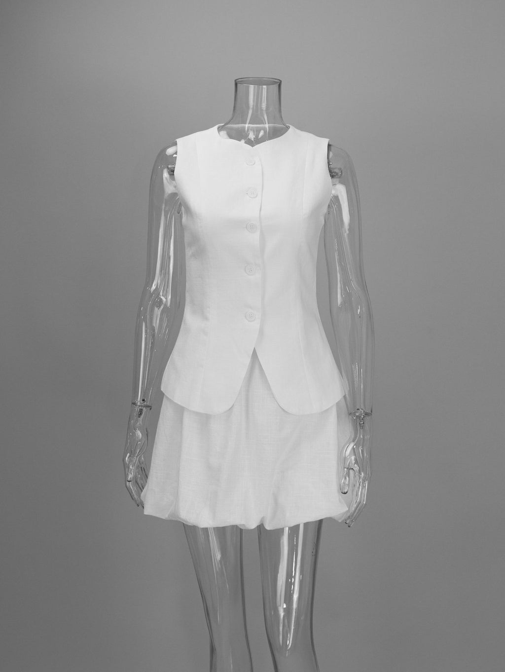 Cotton Peplum Vest & Bubble Mini Skirt Set in White — set on mannequin