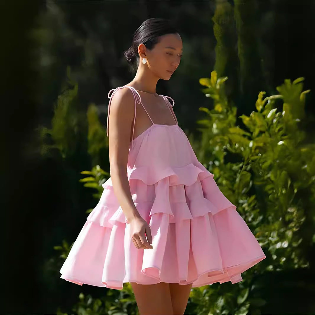 Tiered Ruffle Tie-Strap Mini Dress in Soft Pink — side view on model