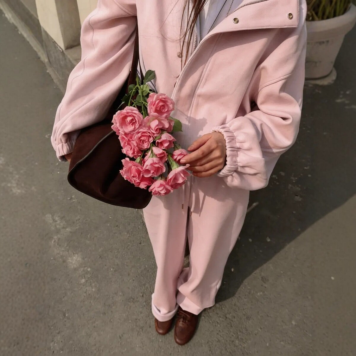 Cotton-Blend Stand-Collar Zip Jacket and Wide-Leg Pants Set in Blush Pink — close view on model