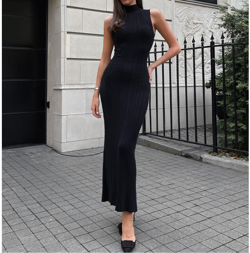 Ribbed Sleeveless Mock-Neck Maxi Dress in Black — full-length view on model
