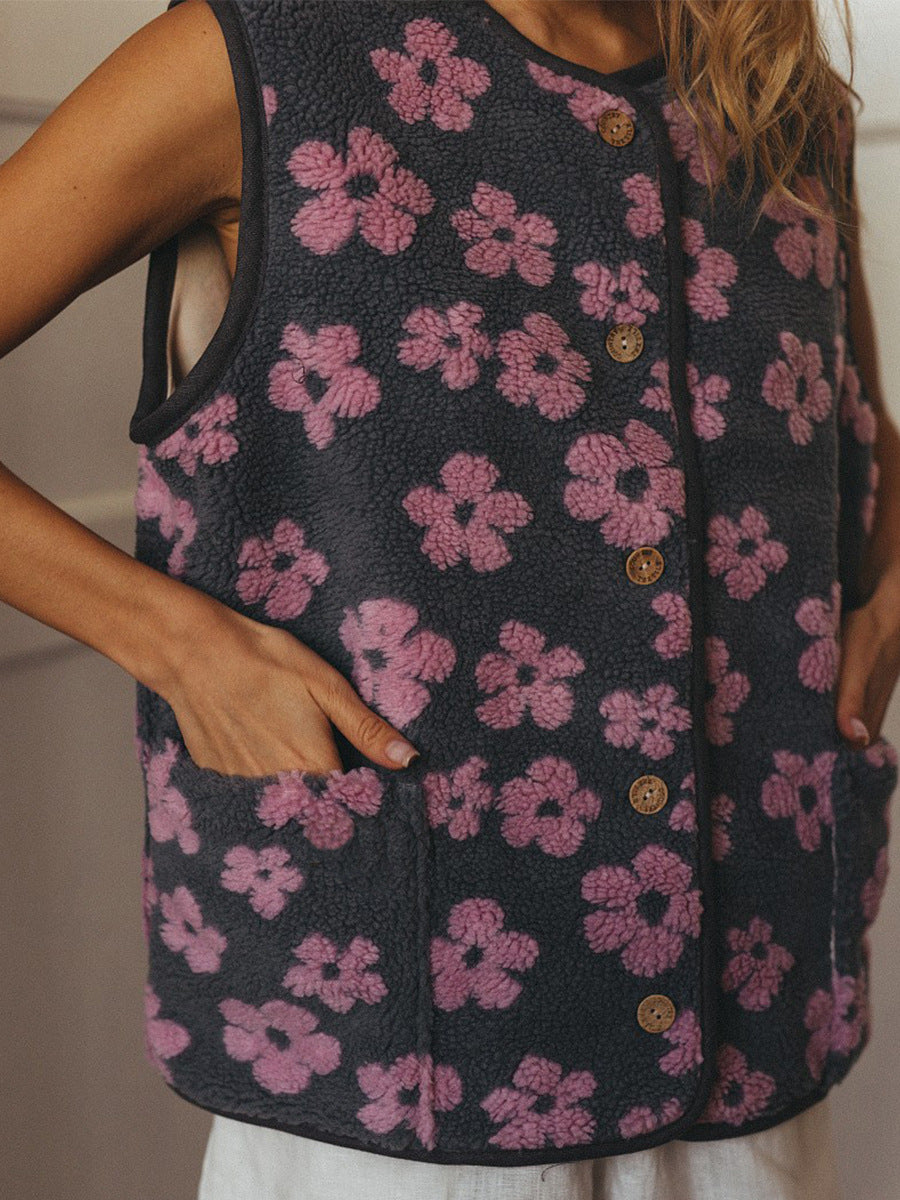 Floral Sherpa Fleece Button Vest with Pockets in Charcoal & Pink Floral — close-up with hand in pocket