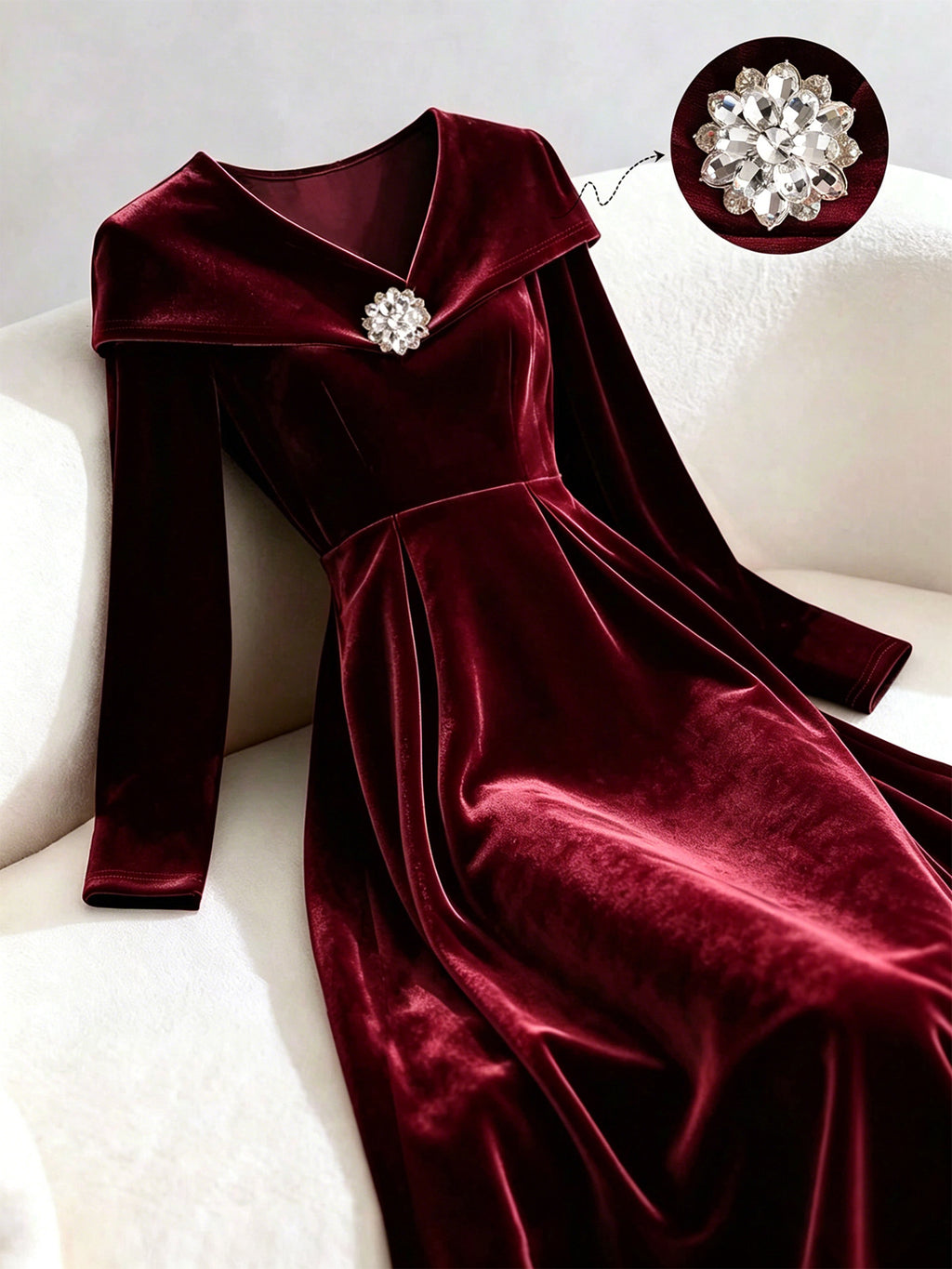 Velvet Midi Dress with Portrait Collar and Rhinestone Brooch in Wine — close-up of the collar and rhinestone brooch