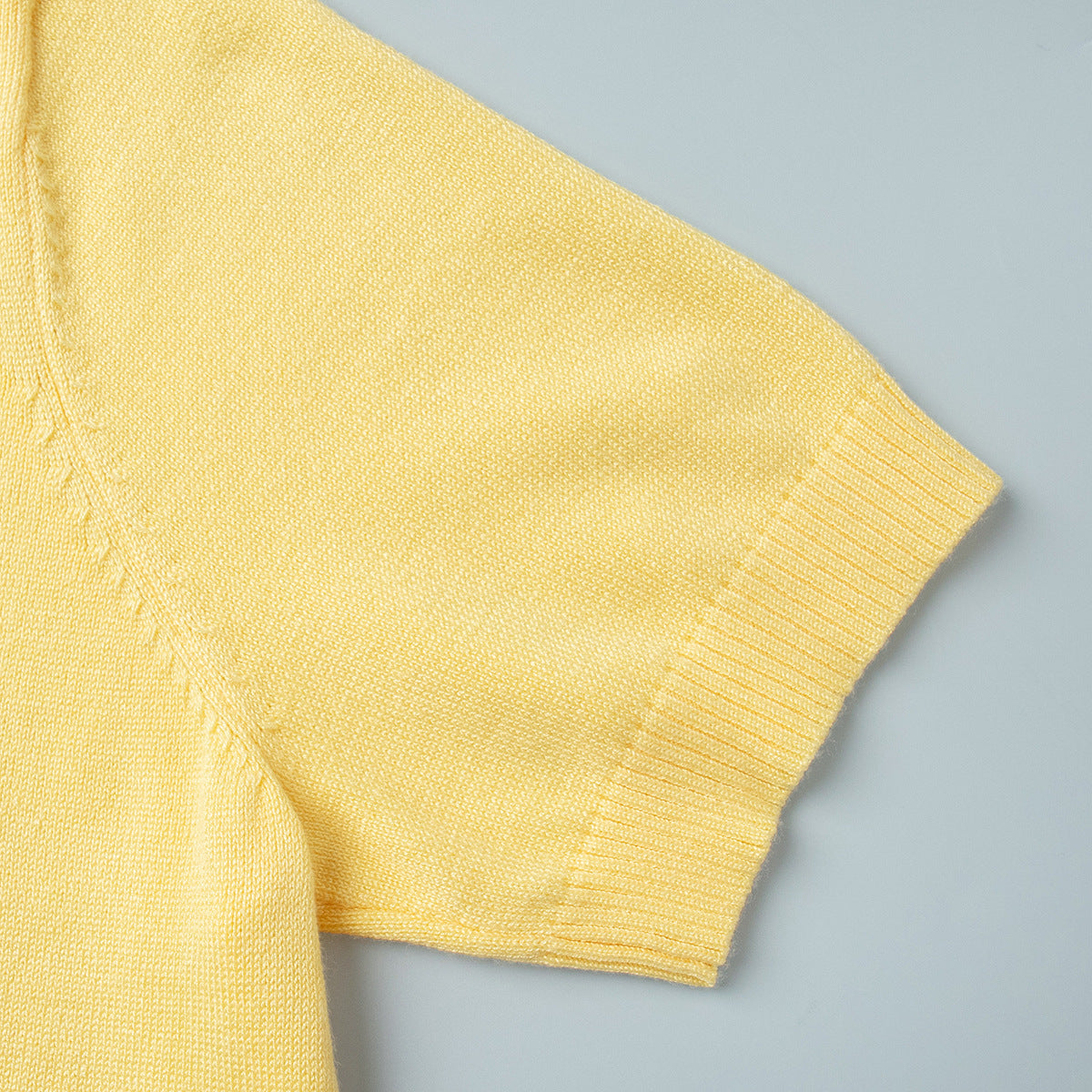 Short Sleeve Knit Top & Maxi Skirt Set in Butter Yellow — close-up of the short sleeve