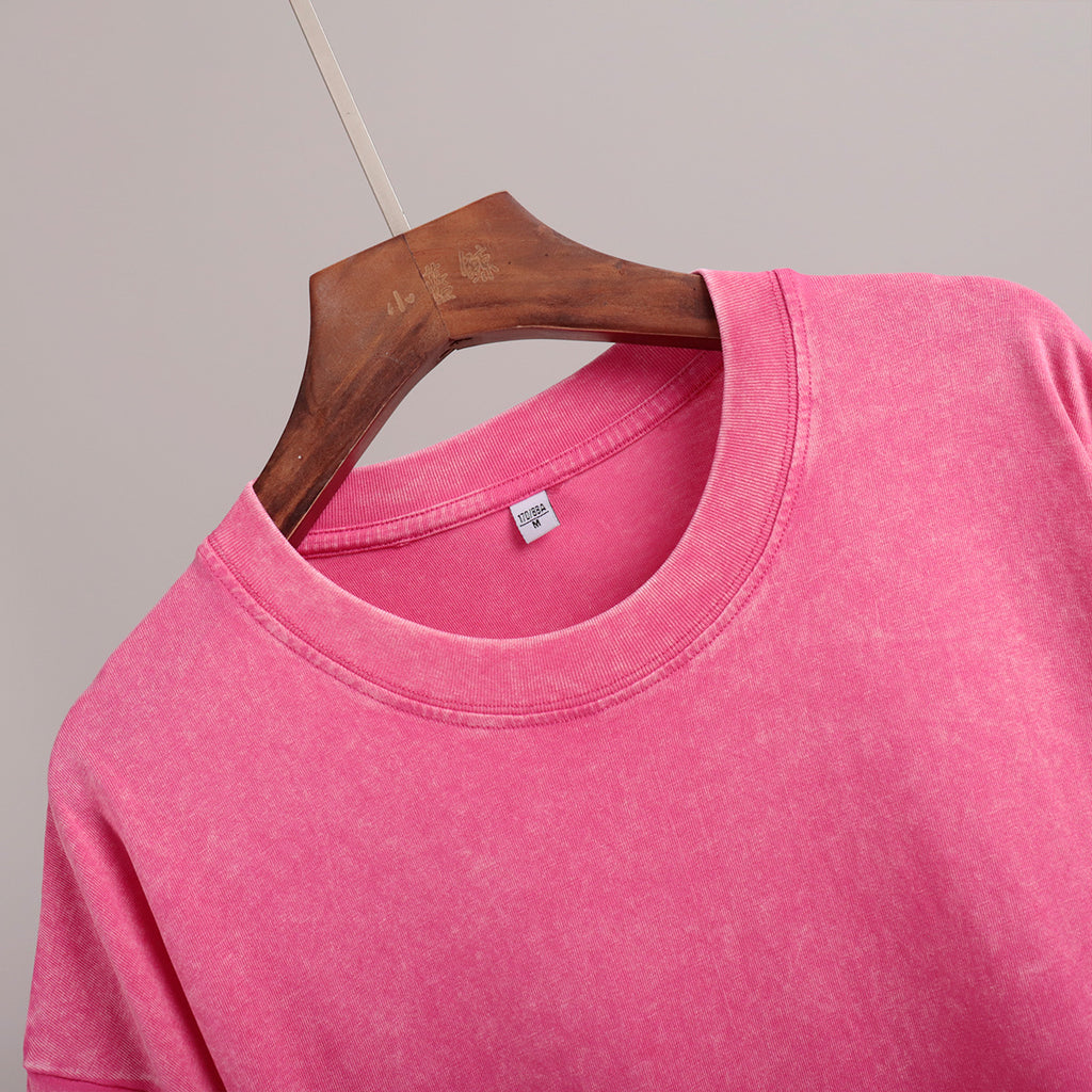 Oversized Washed Cotton Crewneck Tee in Hot Pink — close-up of the ribbed crew neck