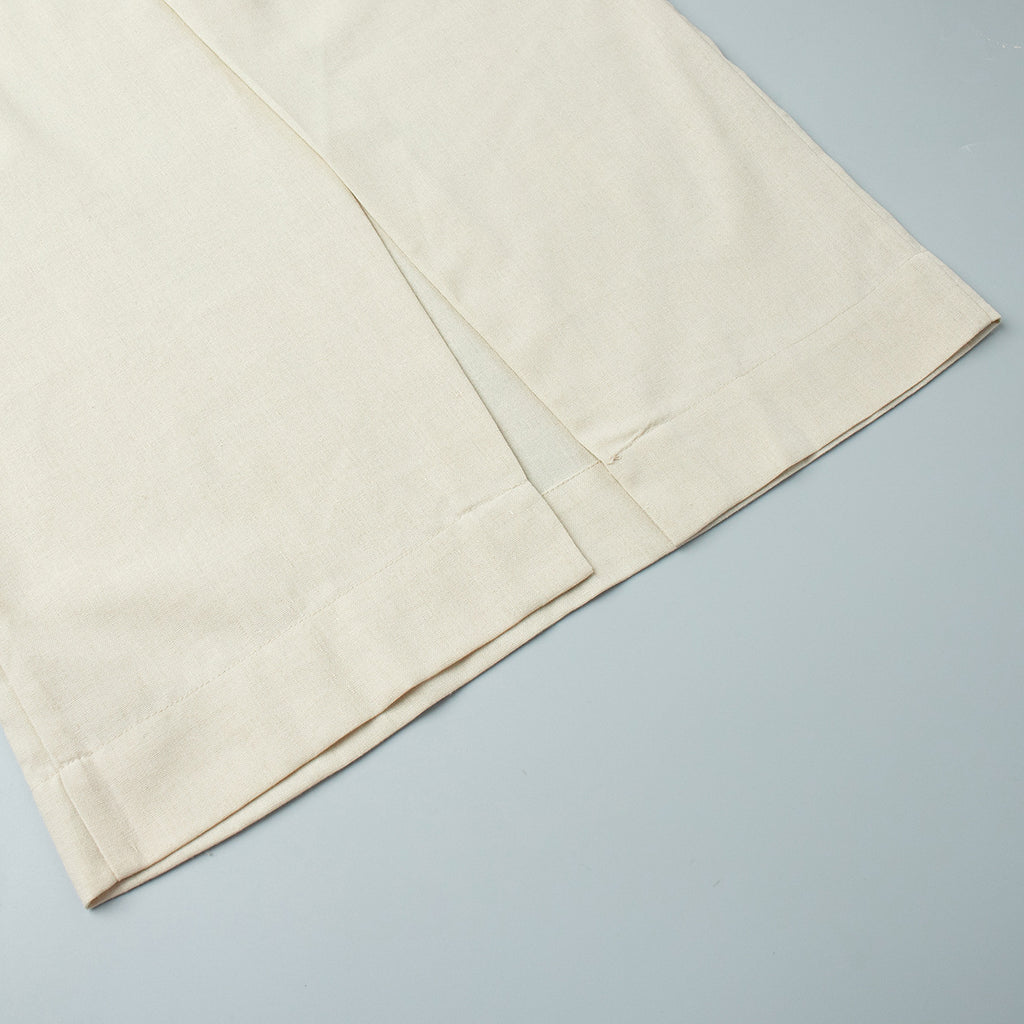 Linen-Blend Vest & Column Maxi Skirt Set in Cream — close-up of skirt hem