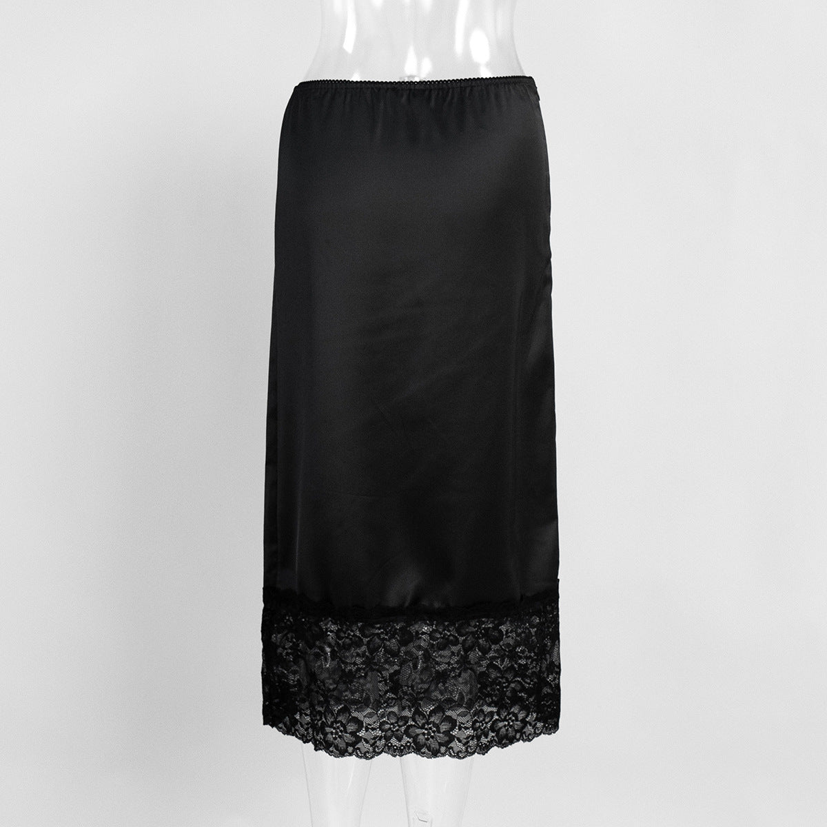 Satin Midi Skirt with Lace Hem in Black — back view on mannequin