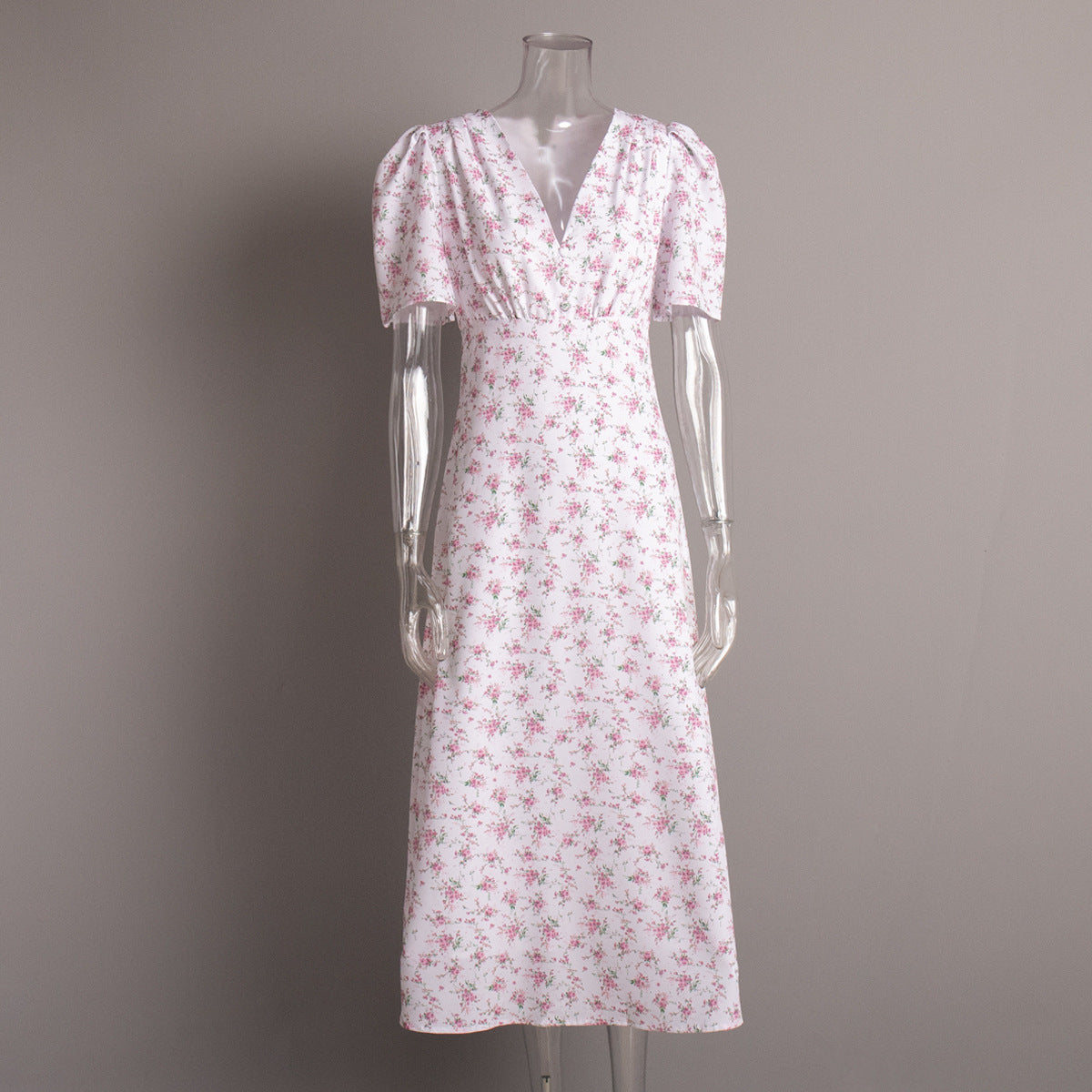 Floral Puff-Sleeve V-Neck Maxi Dress in White Floral — front view on mannequin