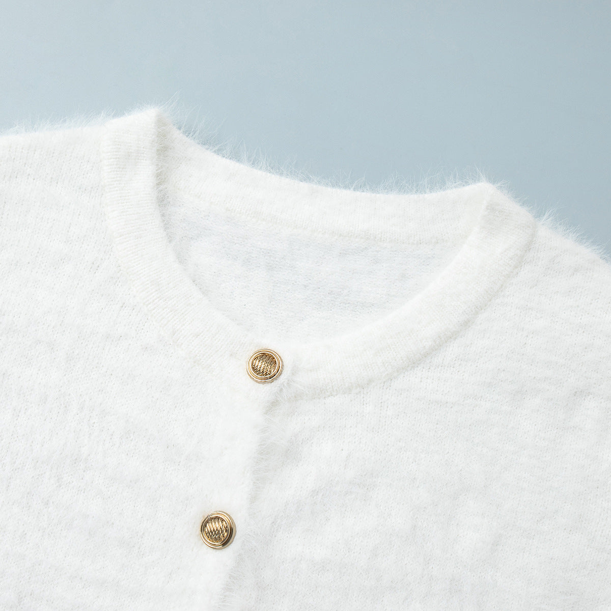 Fuzzy Knit Button Cardigan & Maxi Skirt Set in Winter White — close-up of the neckline and buttons