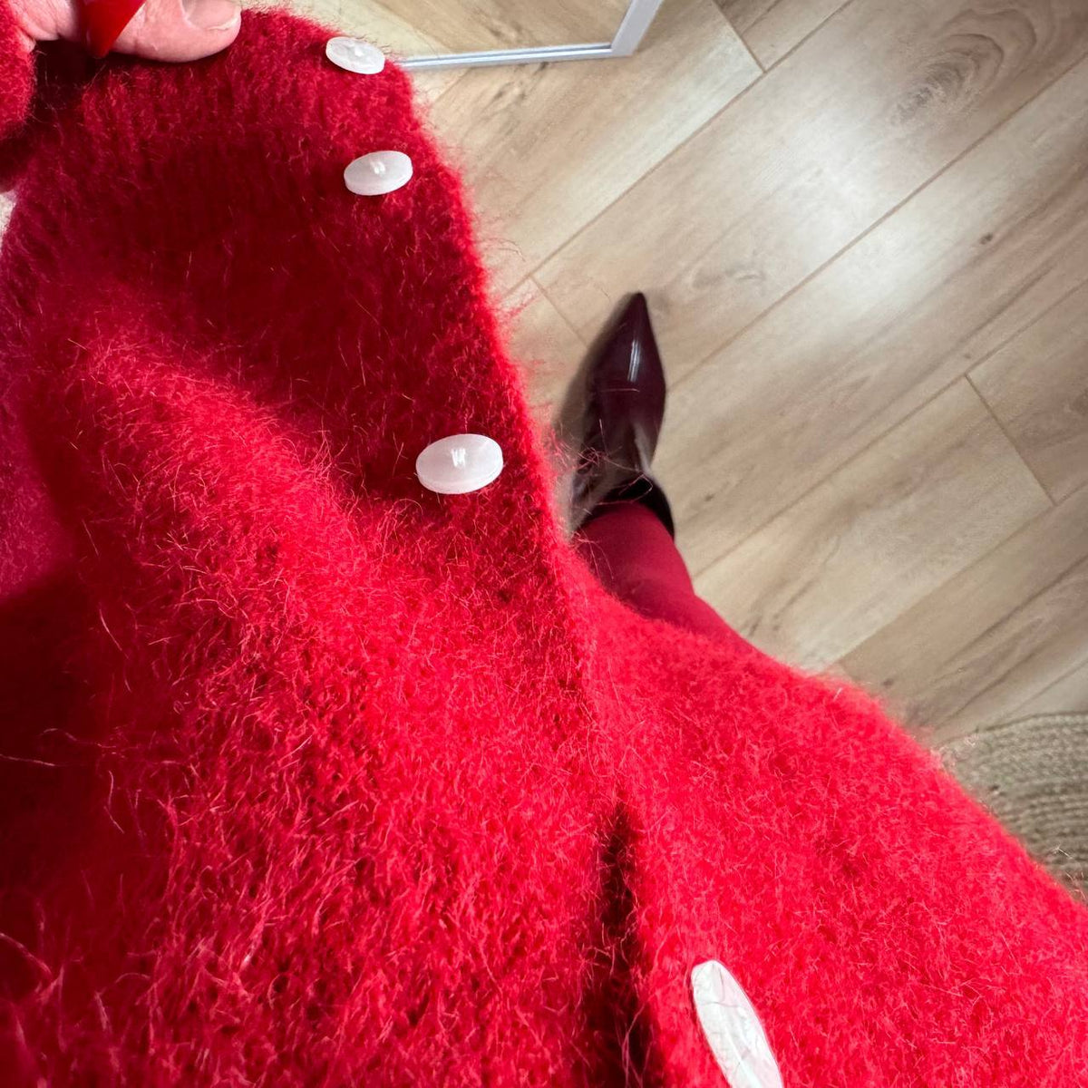 Red Fuzzy Wool-Blend Button Cardigan in Red — close-up of the knit and button placket