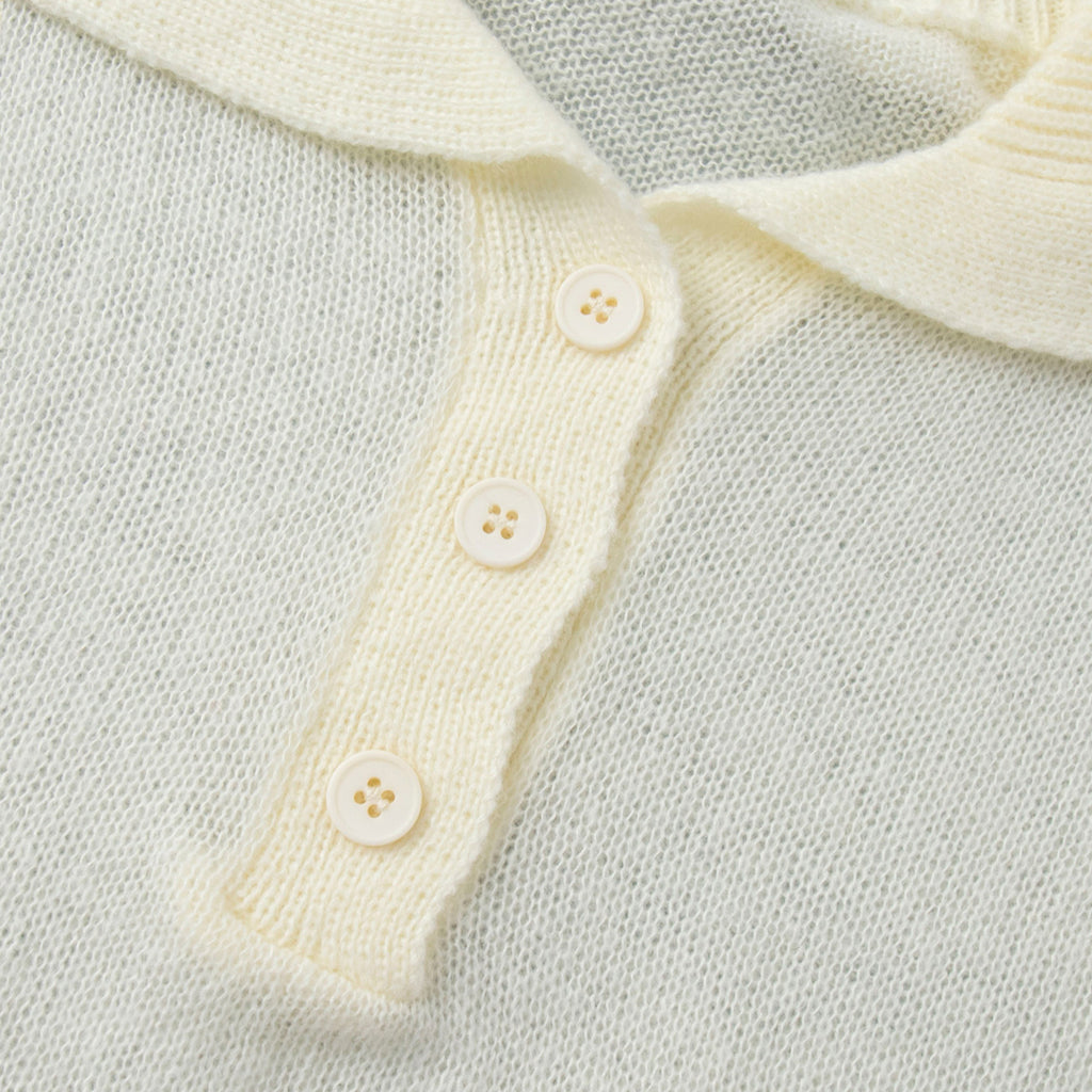 Soft Knit Short Sleeve Polo Top in Cream — close-up of the three-button placket