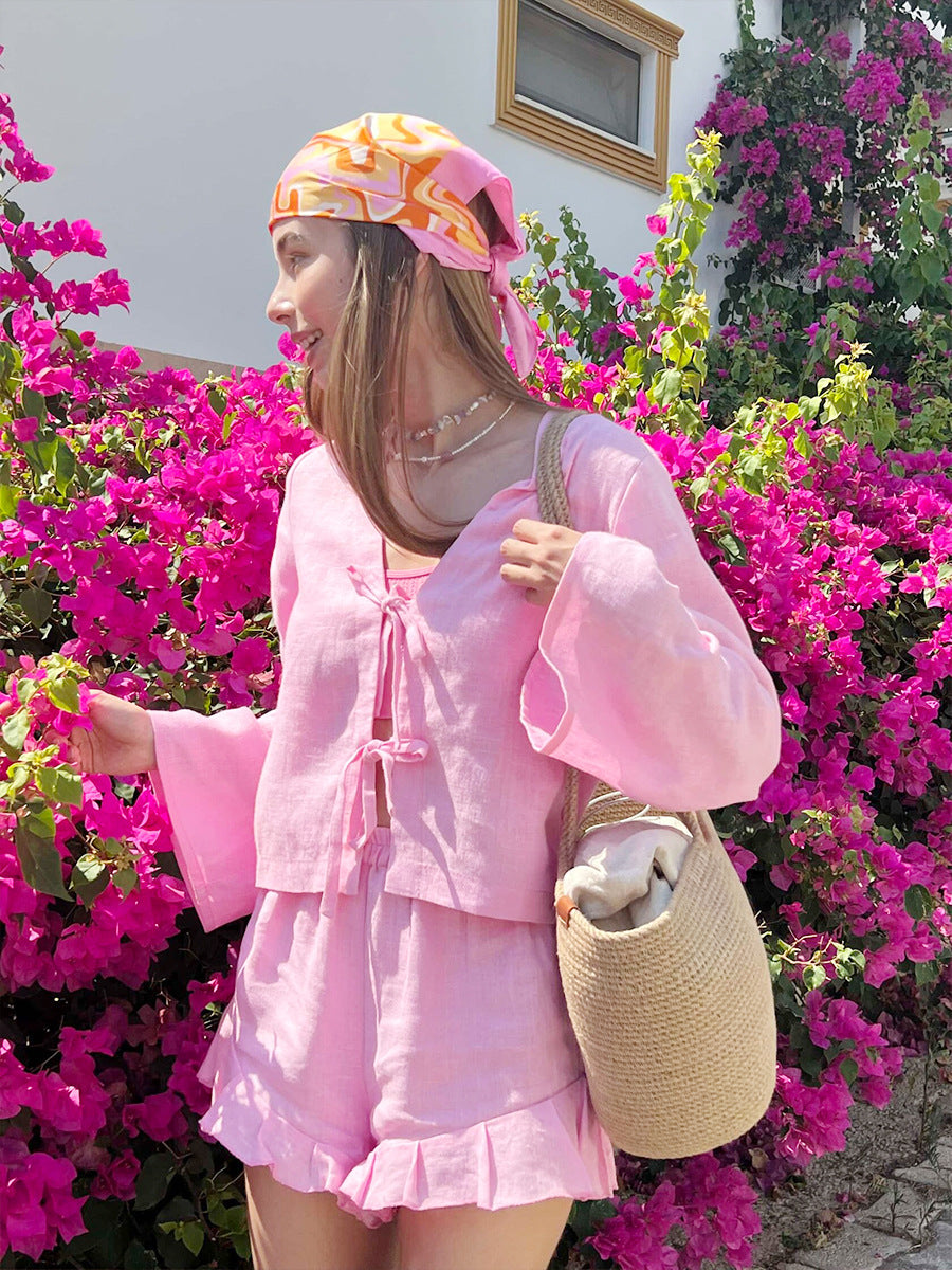 Cotton Tie-Front Top & Ruffle Shorts Set in Pink — outdoor front view by flowers