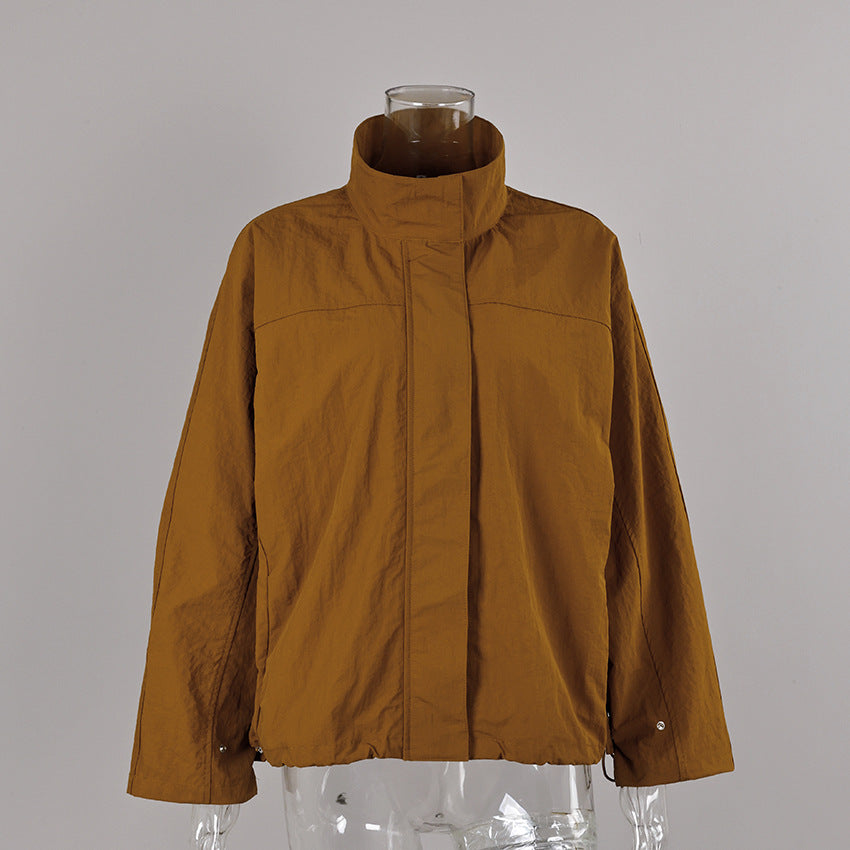 Oversized Stand-Collar Nylon Jacket with Drawcord Hem in Caramel — front view on mannequin