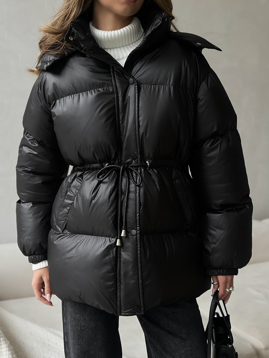 Hooded Puffer Jacket with Drawstring Waist in Black — waist cinched with the drawstring