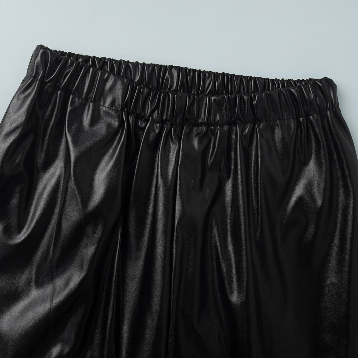 Faux Leather Balloon Pants with Drawstring Ankles in Black — close-up of elastic waistband