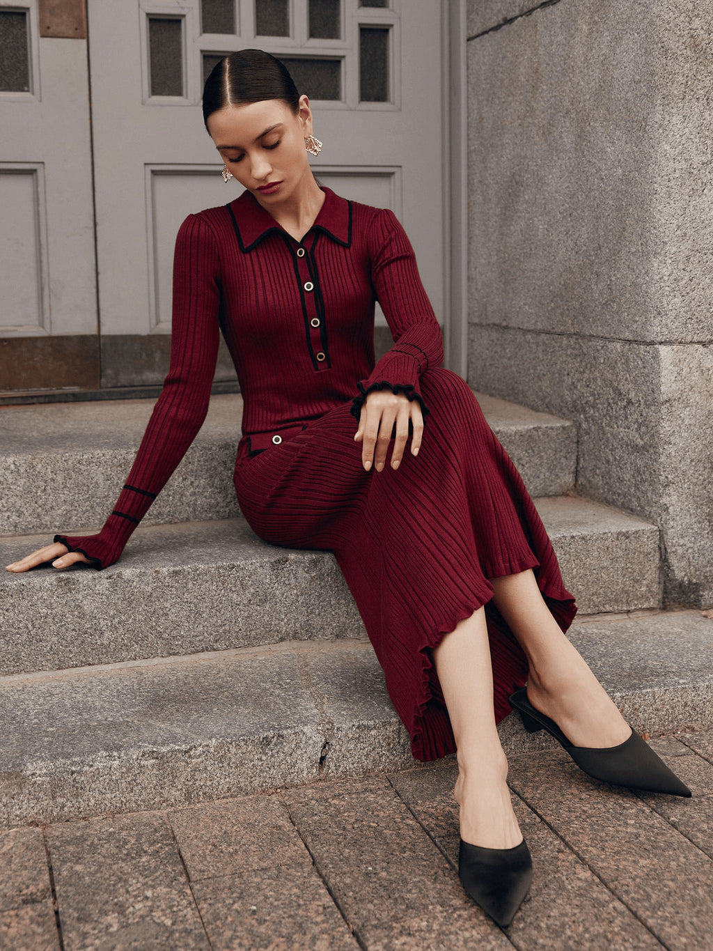 Contrast-Trim Collared Ribbed Midi Dress in Burgundy — seated view showing collar, cuffs and hem