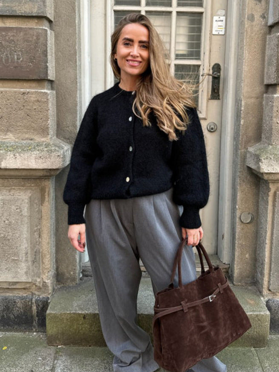 Soft Fuzzy Crew Neck Button Cardigan in Black — full-length view with gray trousers