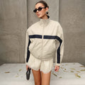 Contrast-Stripe Stand-Collar Track Jacket in Stone — front view on model