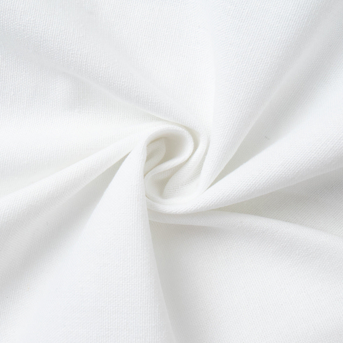 Linen-Blend Vest & Pleated Shorts Set in White — close-up of the linen-blend weave