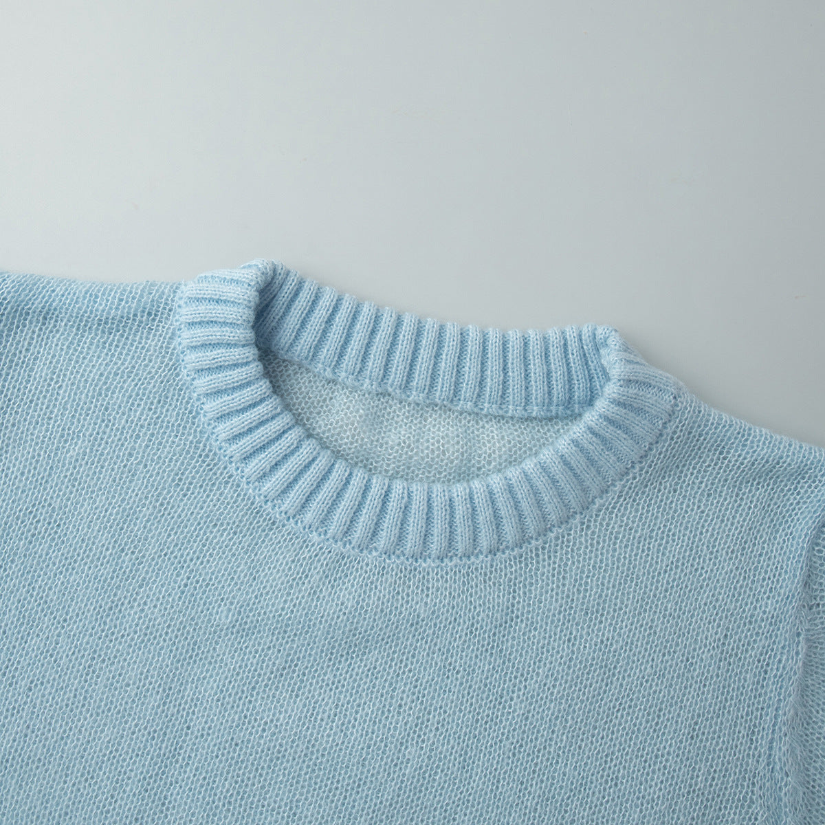 Soft Mohair-Blend Crew Neck Sweater in Light Blue — close-up of ribbed cuff