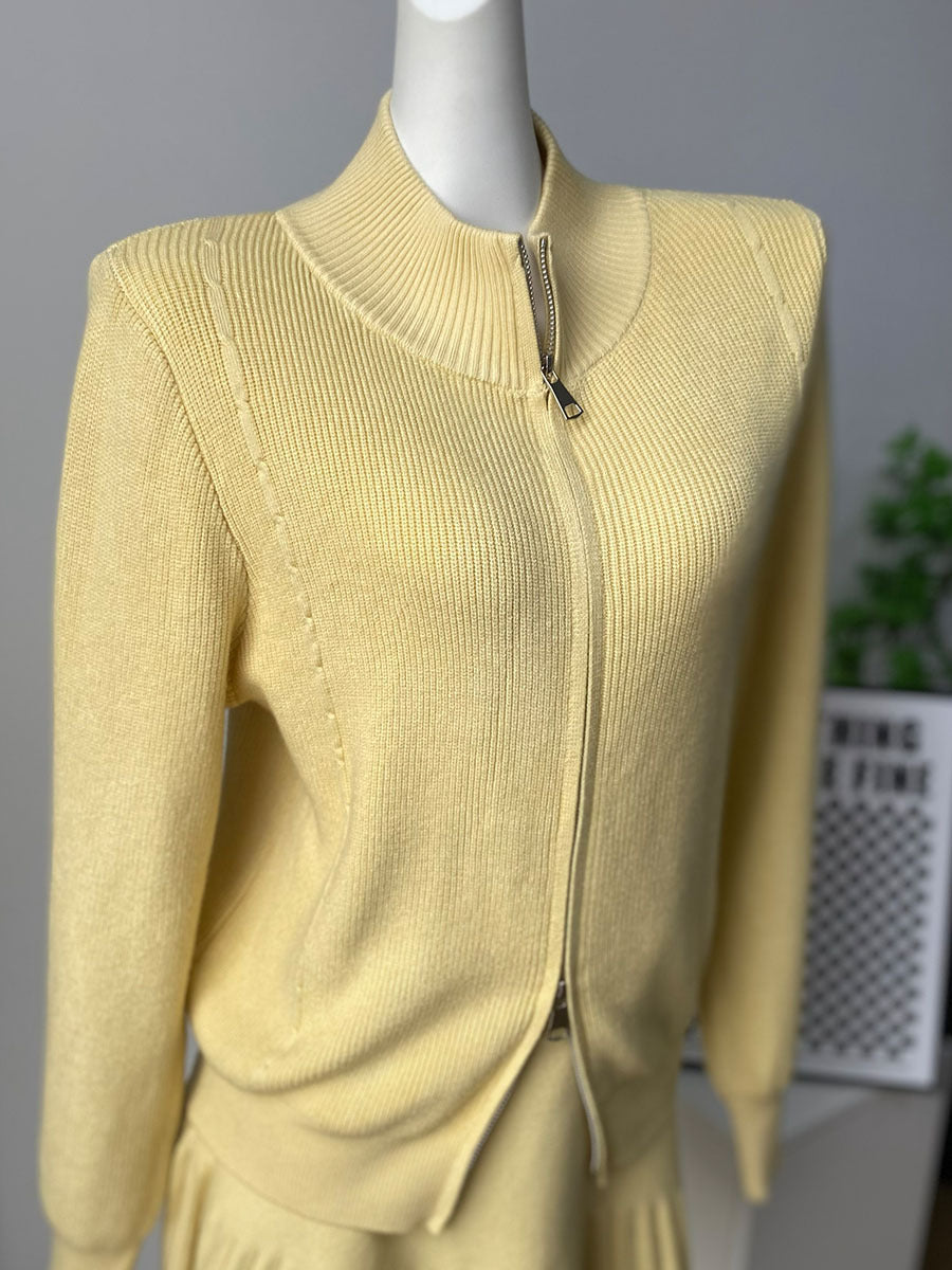 Zip-Up Knit Cardigan & Pleated Mini Skirt Set in Butter Yellow — close-up of the stand collar and zipper
