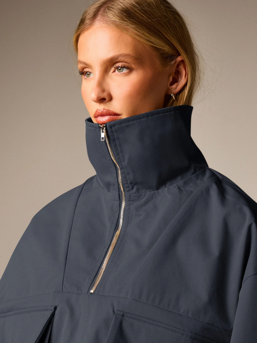 Oversized Half-Zip Funnel-Neck Windbreaker Jacket in Navy — close-up of the funnel neck