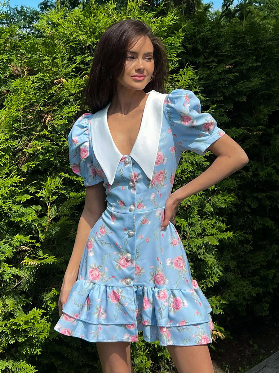 Floral Puff-Sleeve Mini Dress with Contrast Collar in Blue Floral — on model outdoors