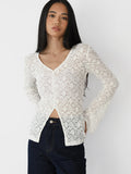 Floral Lace V-Neck Button-Front Top in Ivory — front view on model