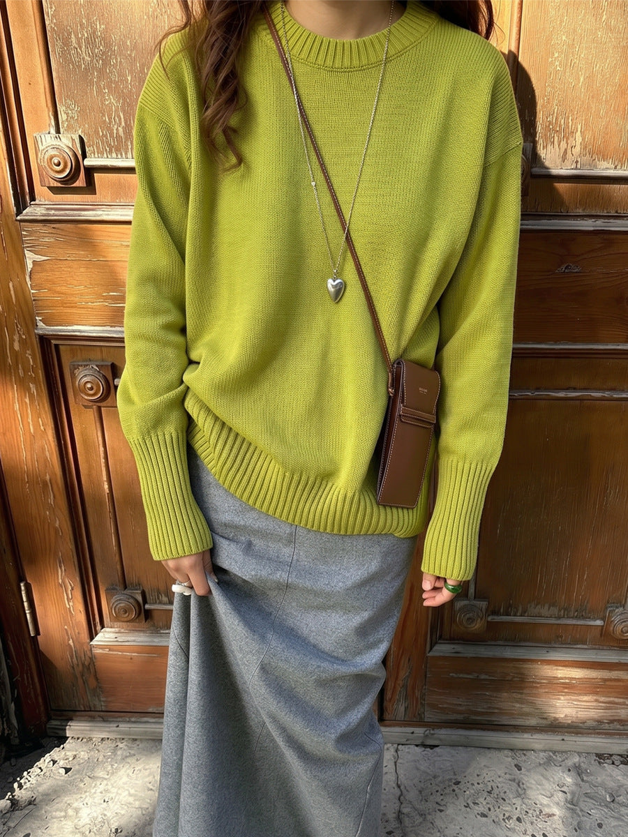 Relaxed Cotton Crew Neck Sweater with Ribbed Cuffs in Chartreuse — front view on model