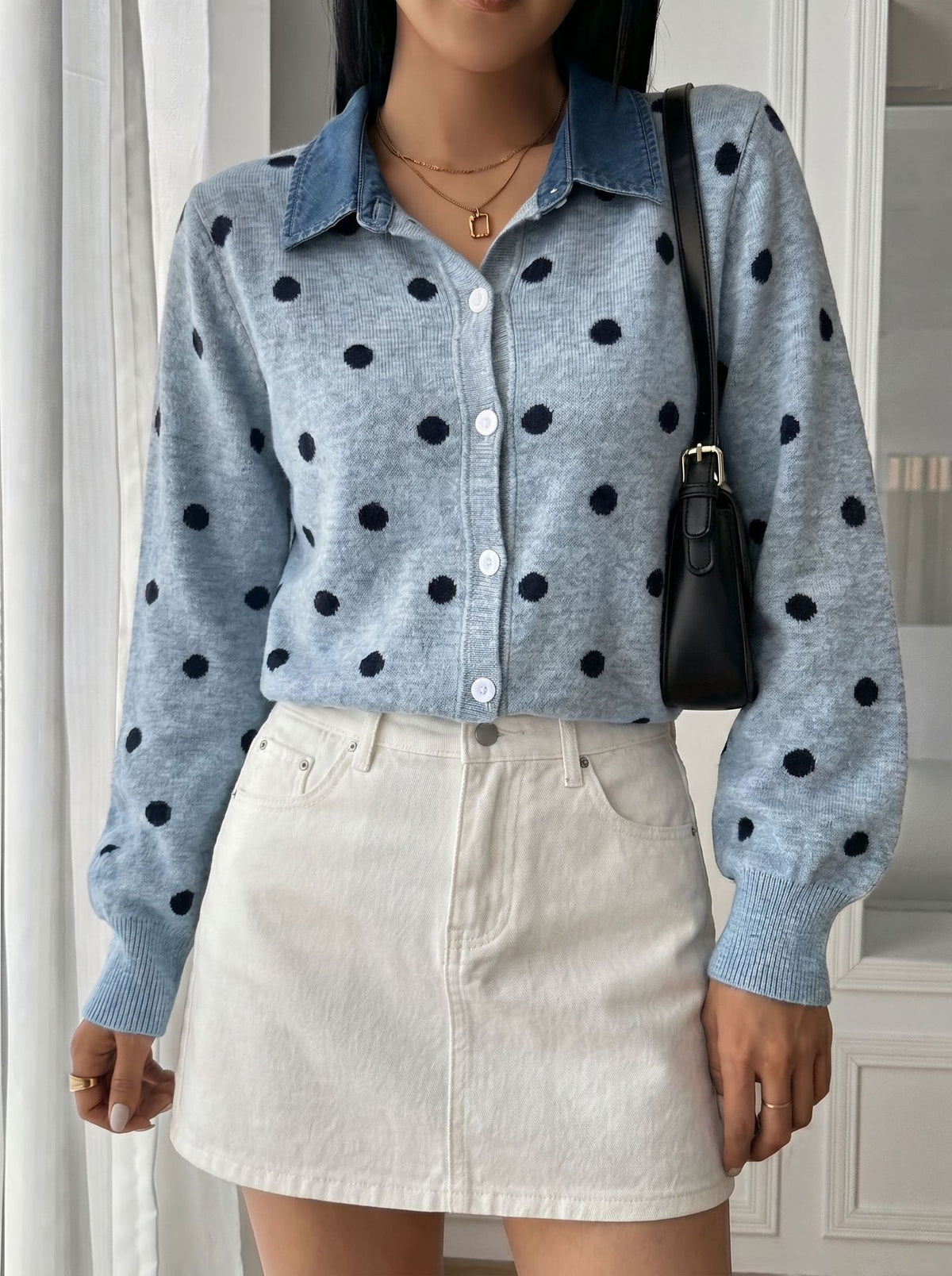 Polka-Dot Cardigan with Denim Collar in Light Blue — front view on model with a mini skirt