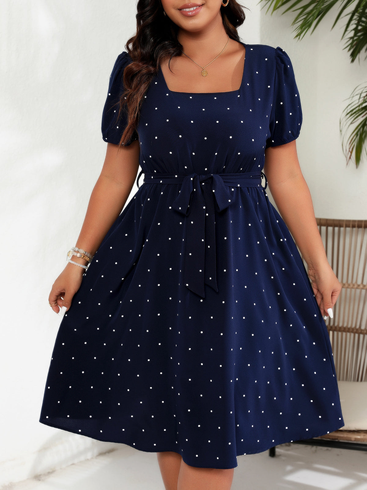 Plus-Size Polka Dot Square-Neck Midi Dress with Tie Waist in Navy — front view on model