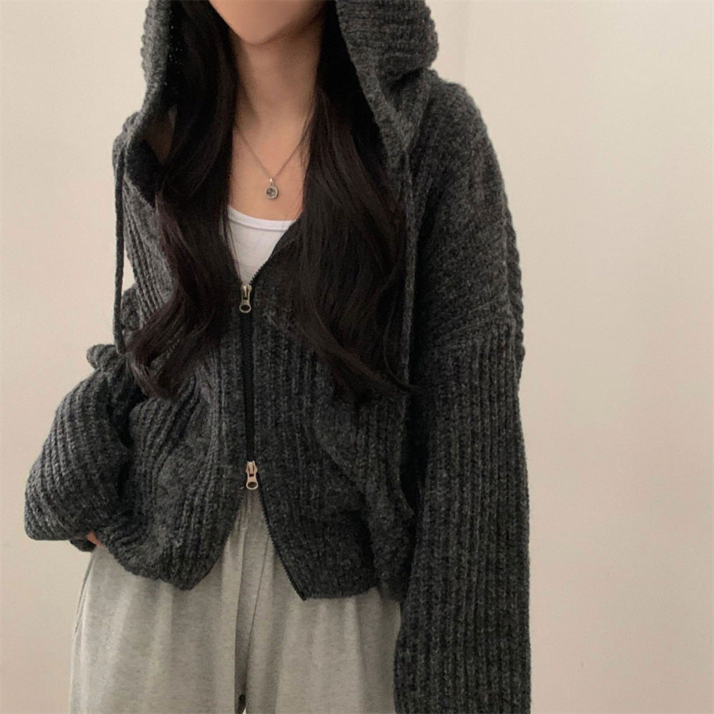 Chunky Cable-Knit Hooded Zip Cardigan in Charcoal — front view on model