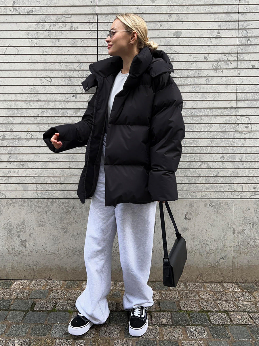 Matte Oversized Hooded Puffer Jacket in Black — full-length view