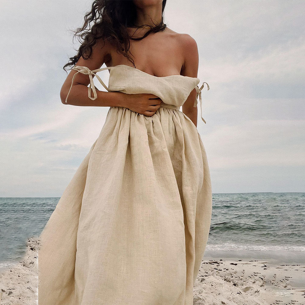 Tie-Shoulder Open-Back Cotton Maxi Dress in Apricot — front view on model, beach